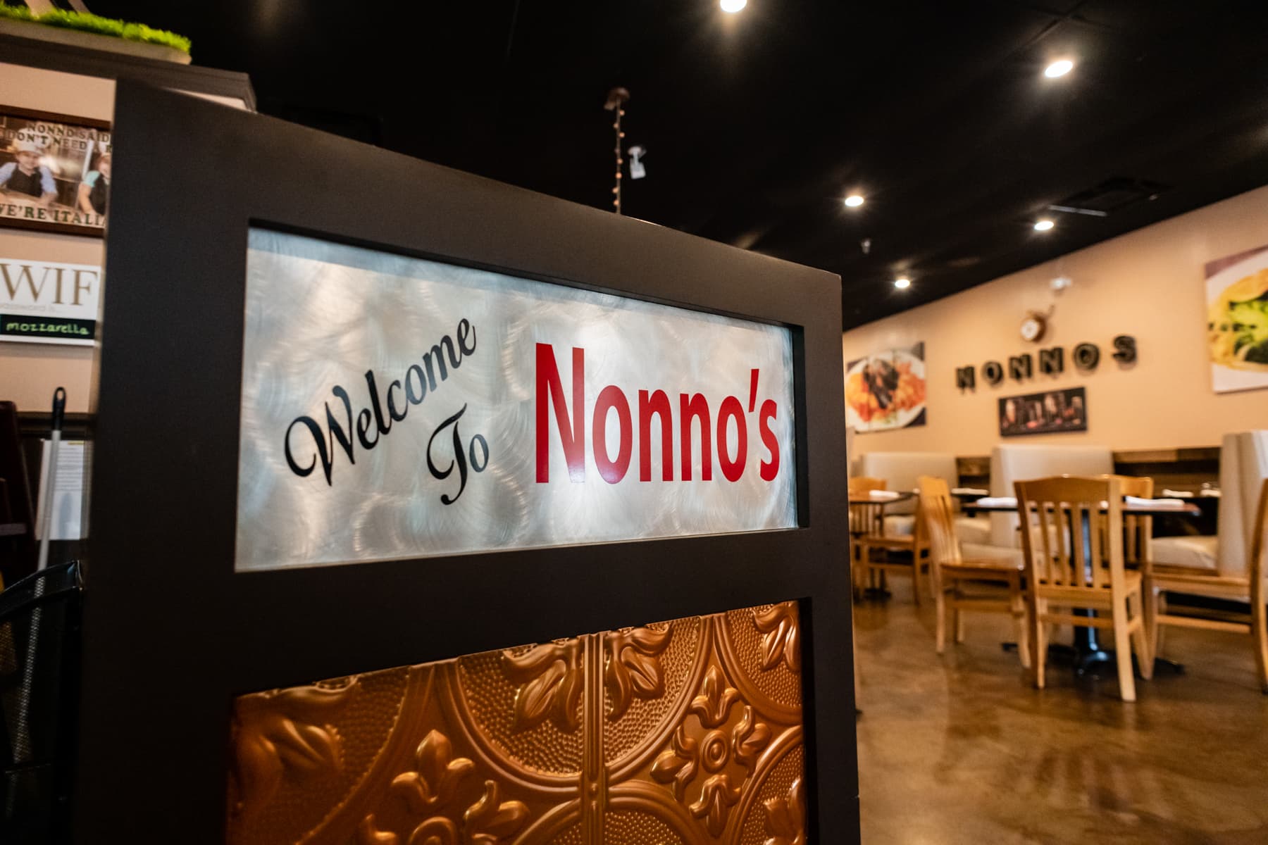 Welcome to Nonno's sign in the restaurant dining room